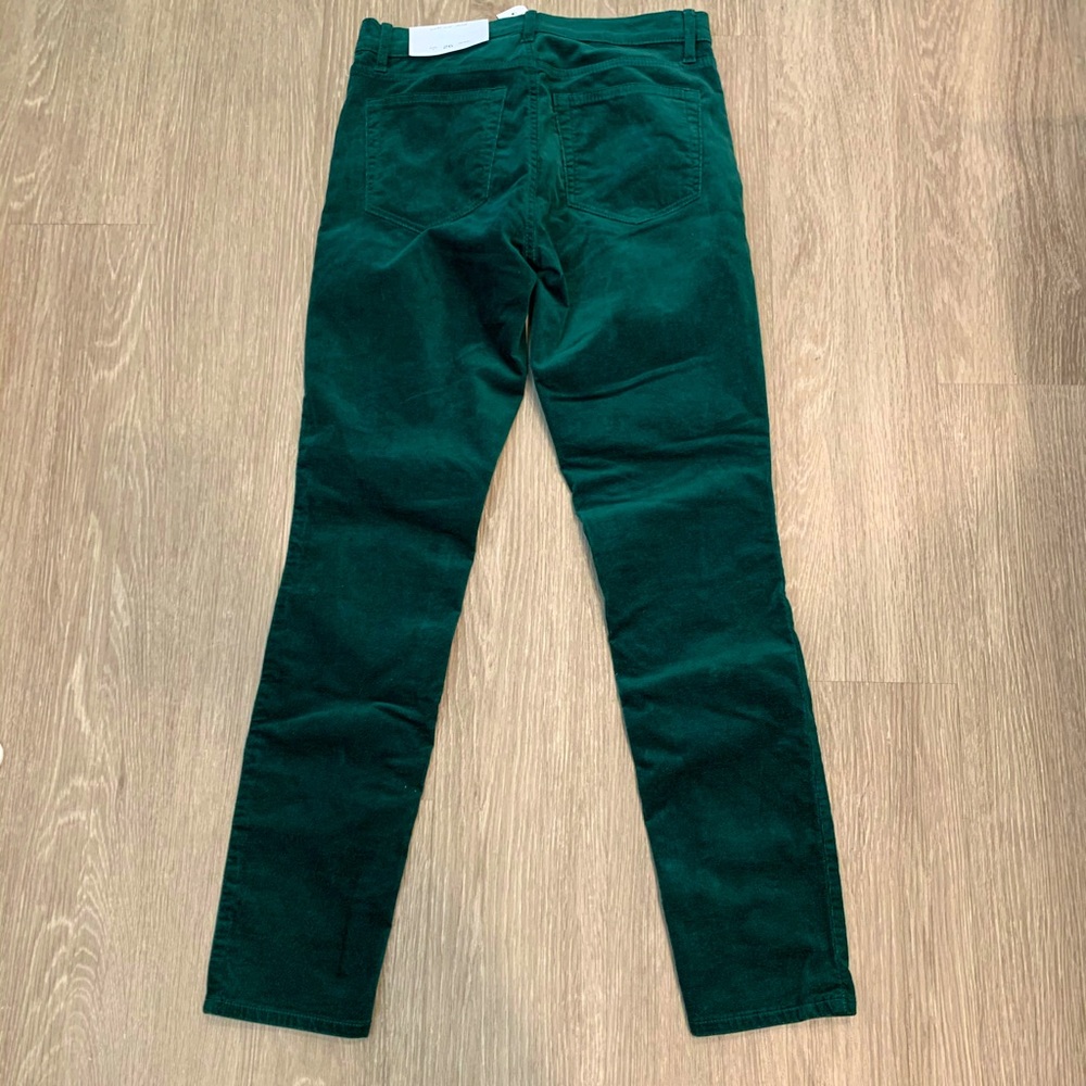 Emerald green Loft velvet skinny pants.